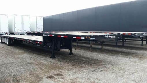 Image from: https://www.mylittlesalesman.com/2020-demco-53x102-tandem-axle-steel-drop-deck-trailer-air-ride-fixed-spread-axle-9895867